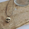 Unisex Skull necklace - Synthetic ivory skull on brown Waxed Polyester Cord